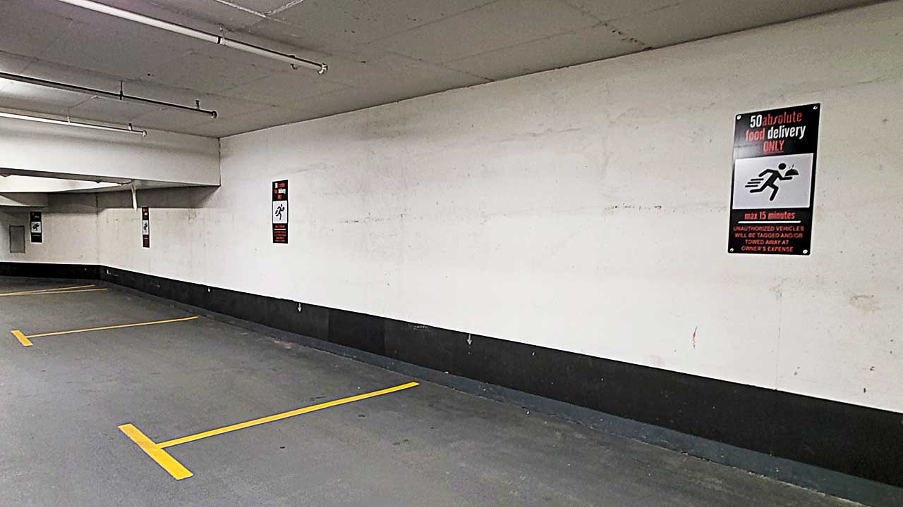 Image of delivery parking spots for residents of 50 Absolute World